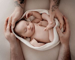 Natural newborn photography documenting the first weeks of life