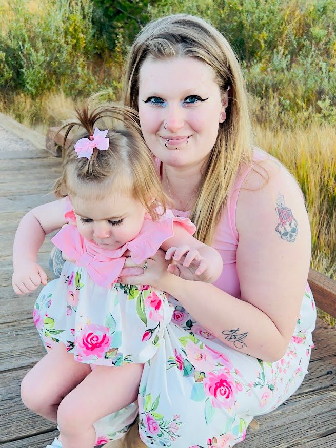 mom holding child