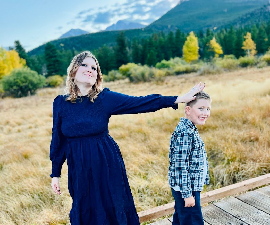 girl and boy standing apart - girl pushing boy away