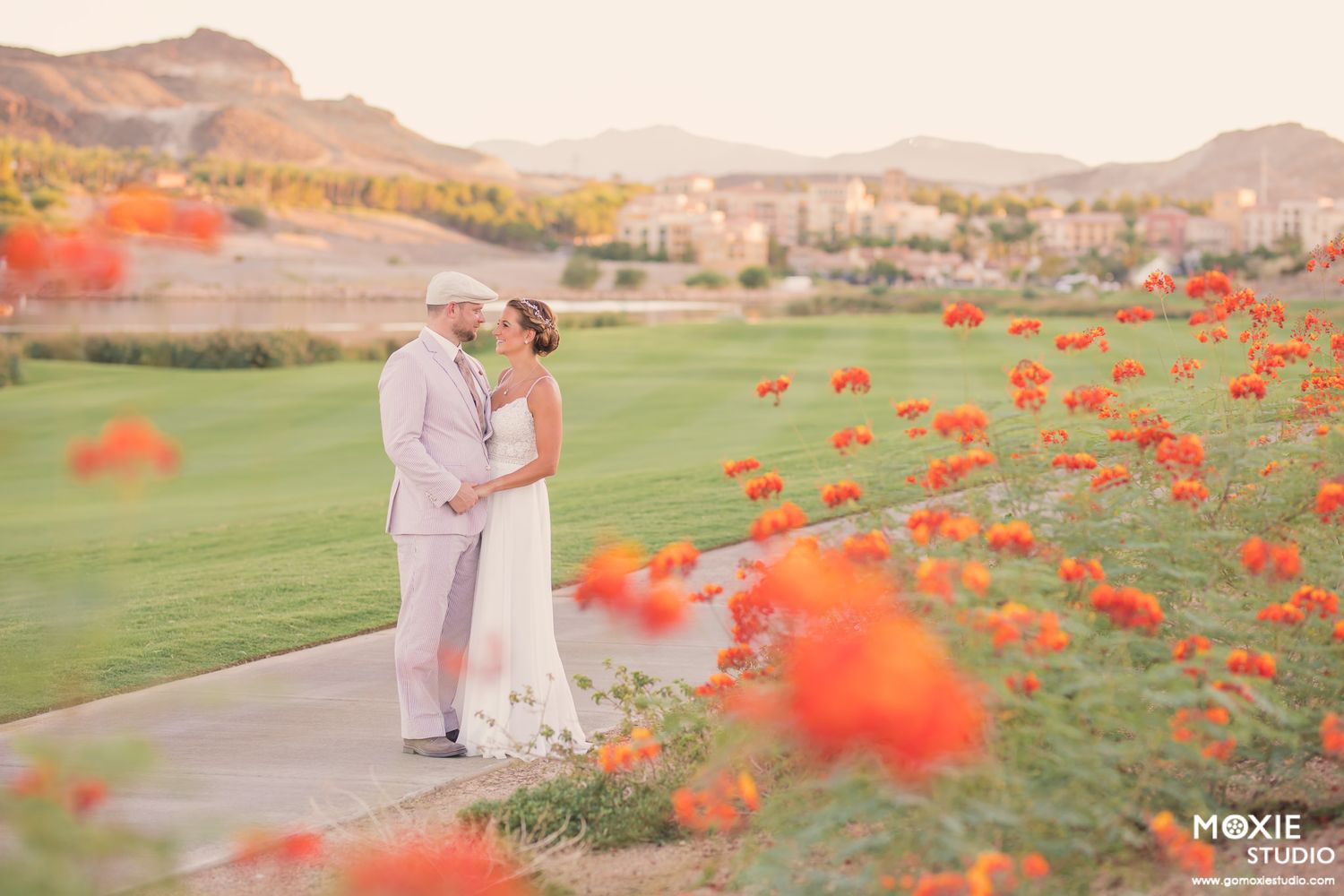 bride and groom portraits at DragonRidge Country Club sunset