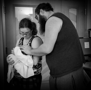 Black and white series showing emotional moments in a hospital setting.
