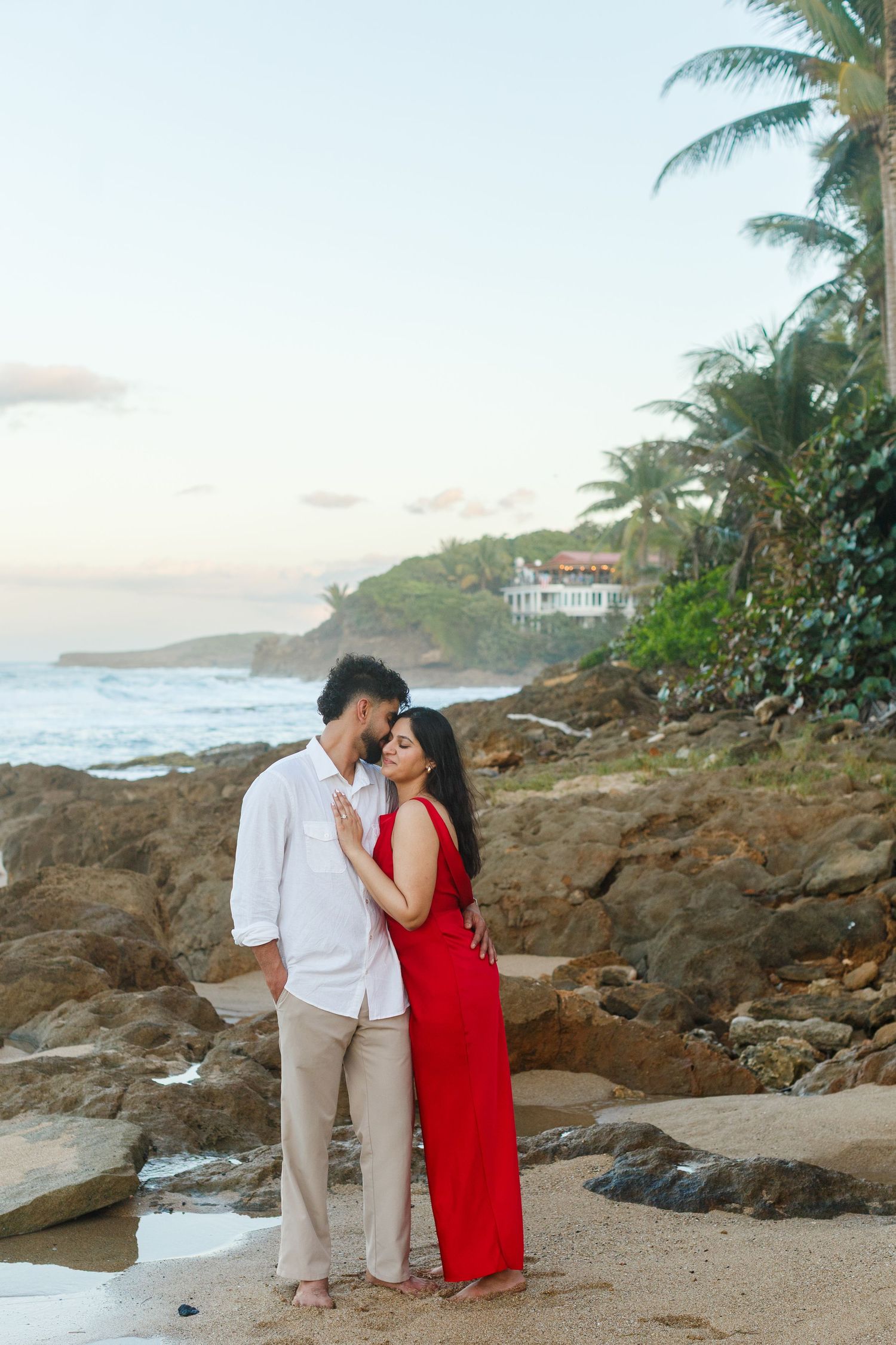 Couples portrait. Proposal and engagement session. Man and woman on the beach. Kikita Surf Beach, Dorado, Puerto Rico.