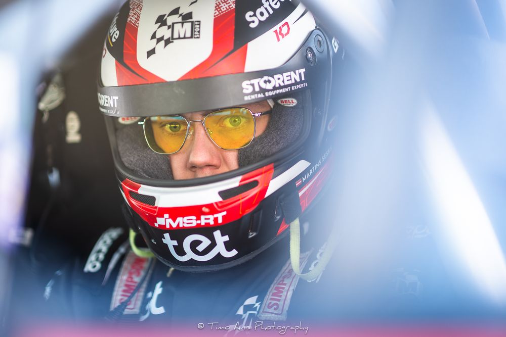 Close-up shots of race car drivers wearing helmets and safety gear in their cockpits during a motorsport event.