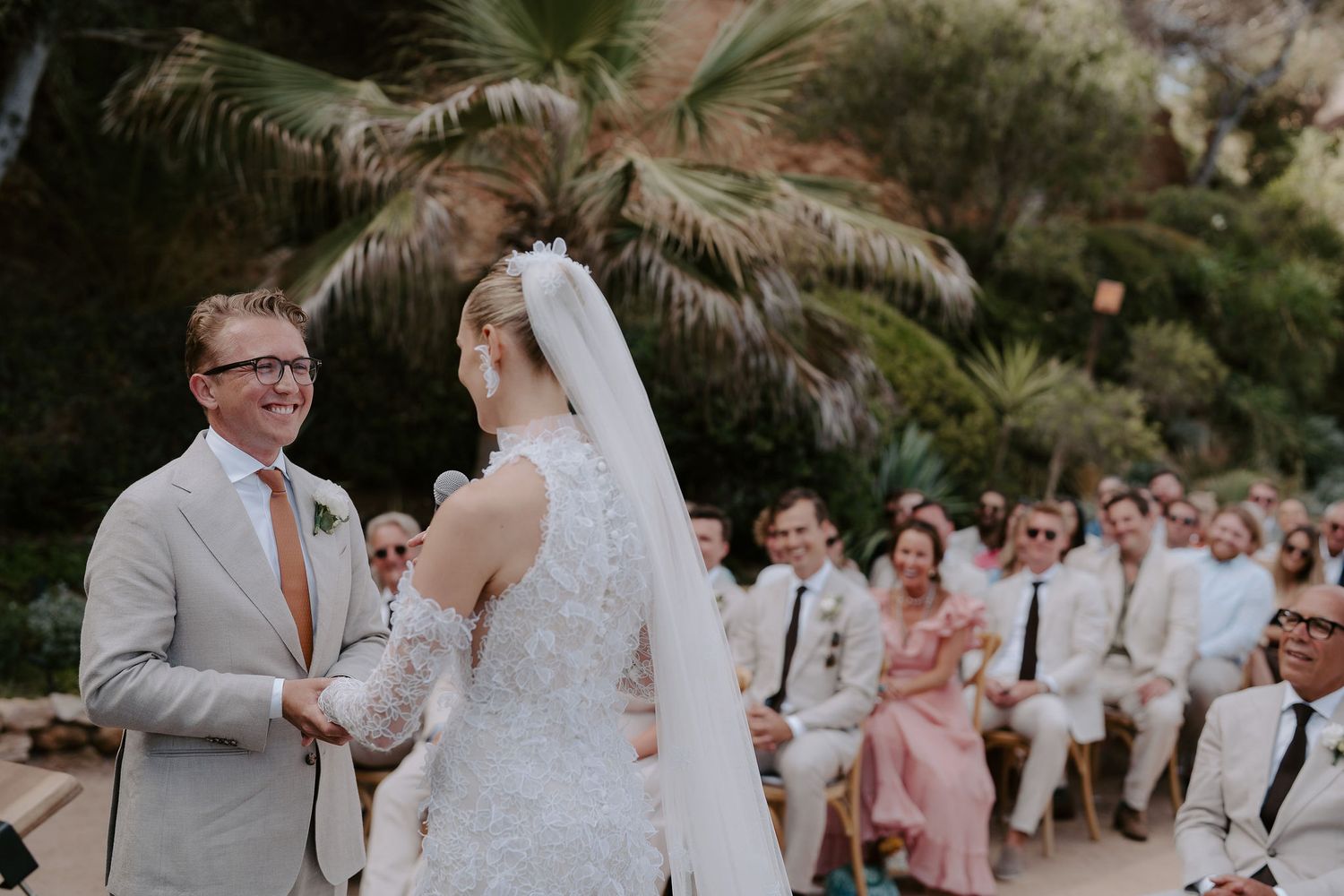 groom smiling at bride during ceremony at amante ibiza