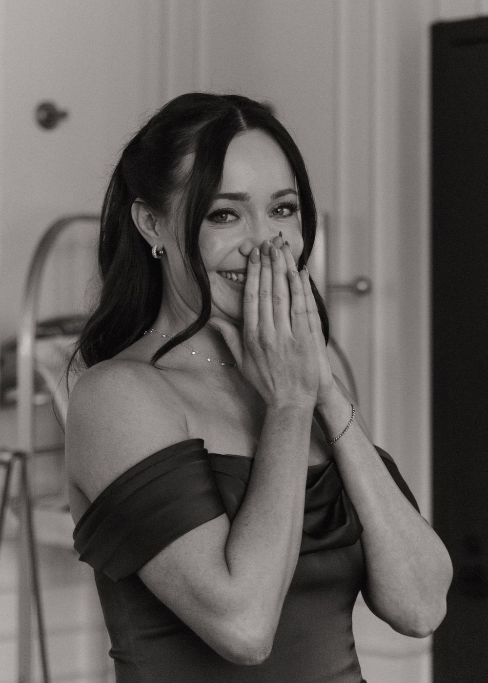 Emotional reactions captured in a sequence showing hands covering face during a special moment.