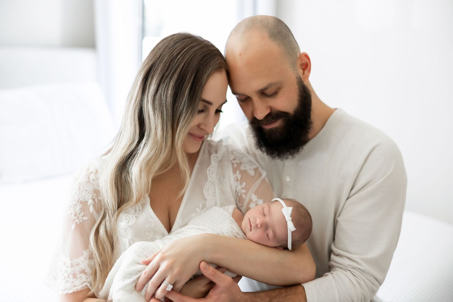 tiny fingers and toes 6 month old in home baby photos
Lifestyle baby session with parents and baby girl OC