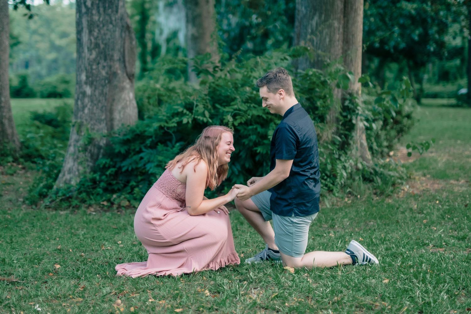 Heartfelt “yes” moment captured perfectly at surprise engagement, in a park in Essex County.