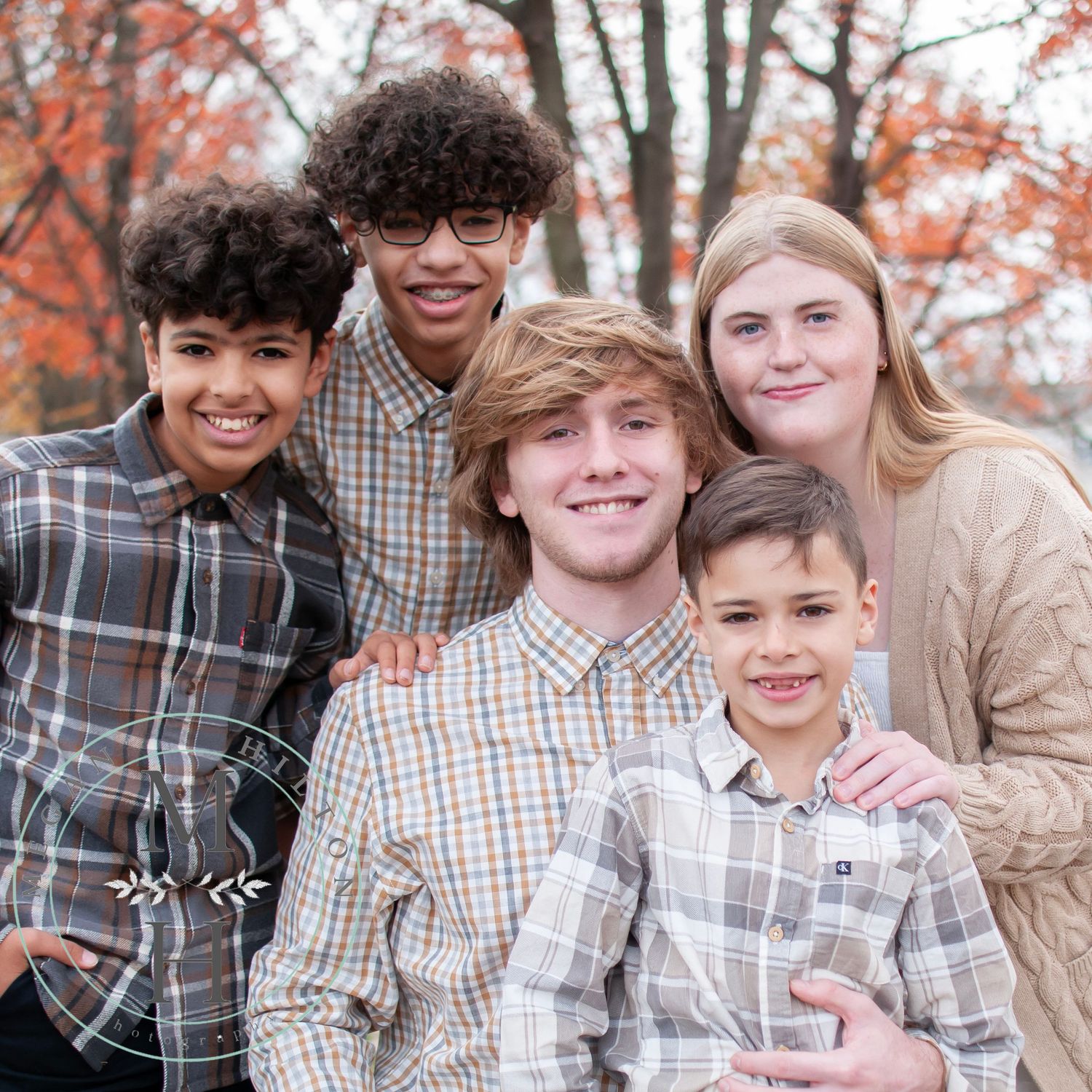 Photo of cousins together in the fall