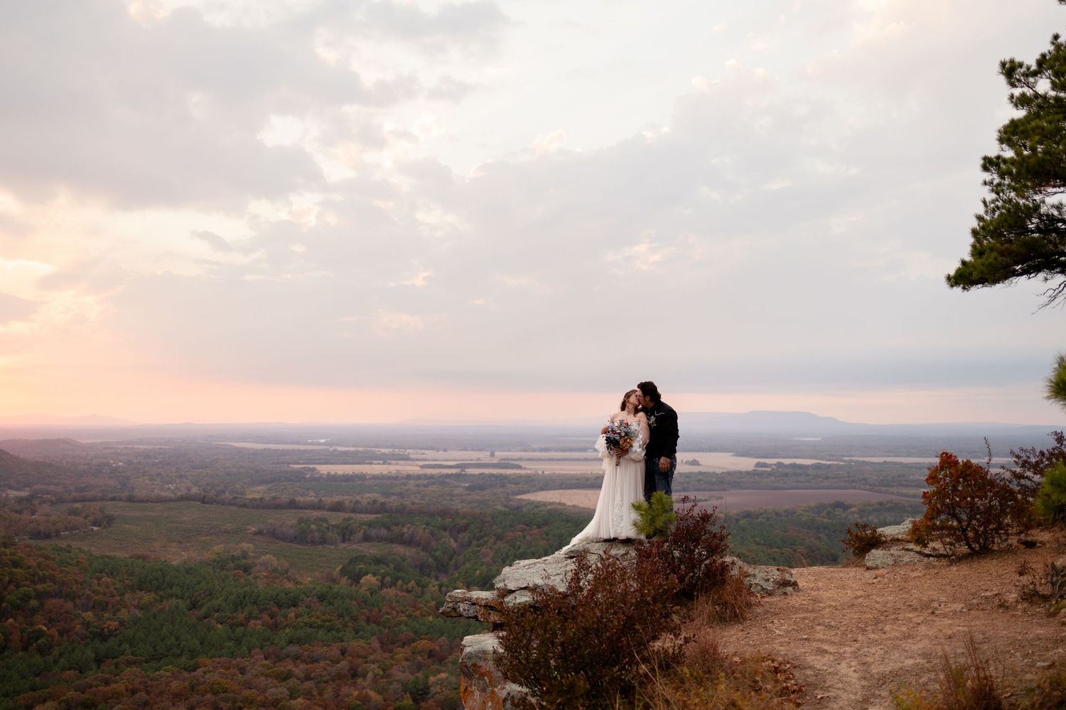 petit jean elopement bride and groom with sunset