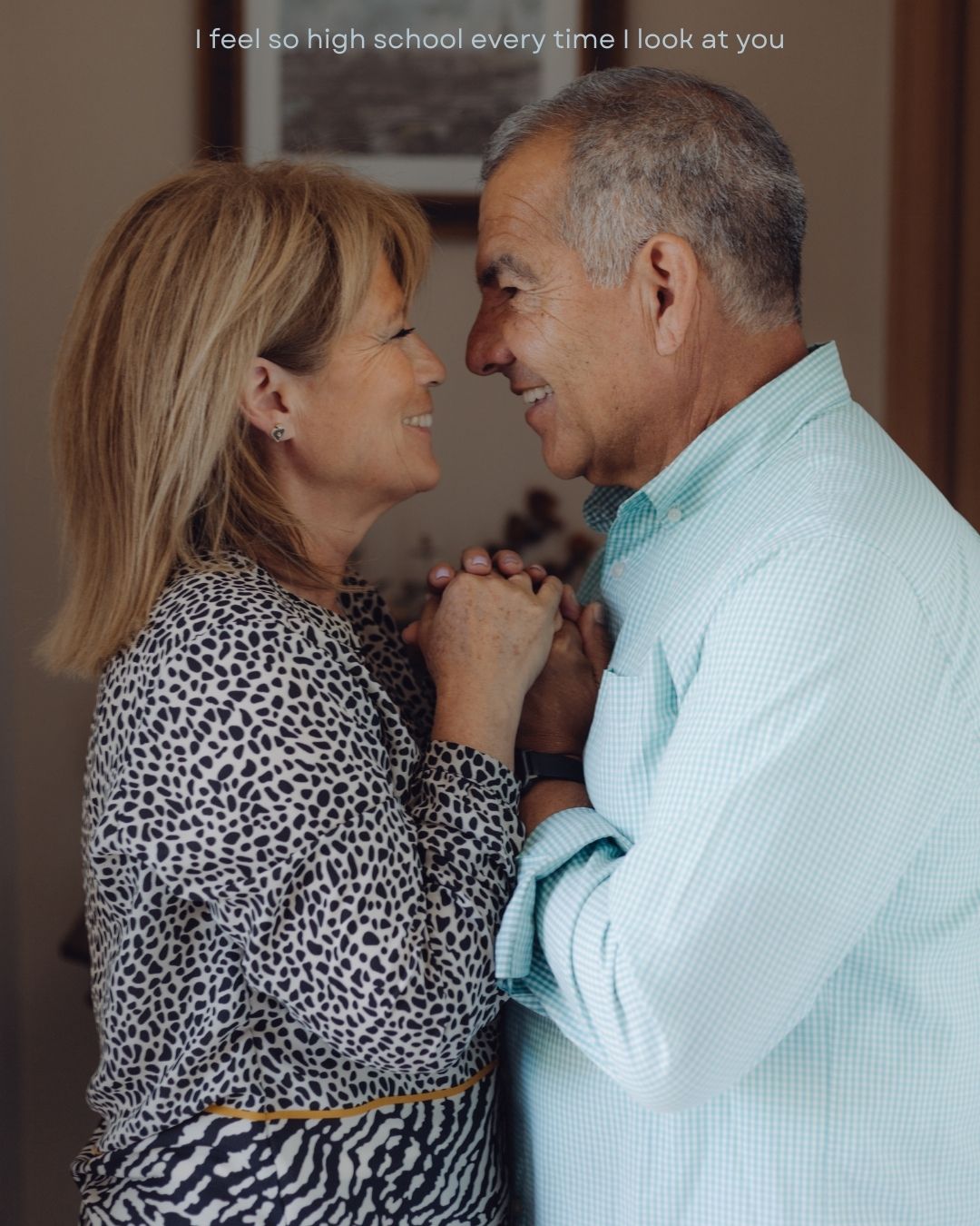 Mature couple holding hands and gazing lovingly at each other with text overlay about high school.