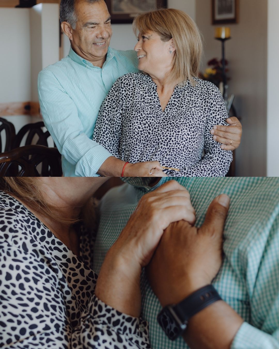 Middle-aged couple smiling and holding hands affectionately indoors, sharing a warm and loving moment together.