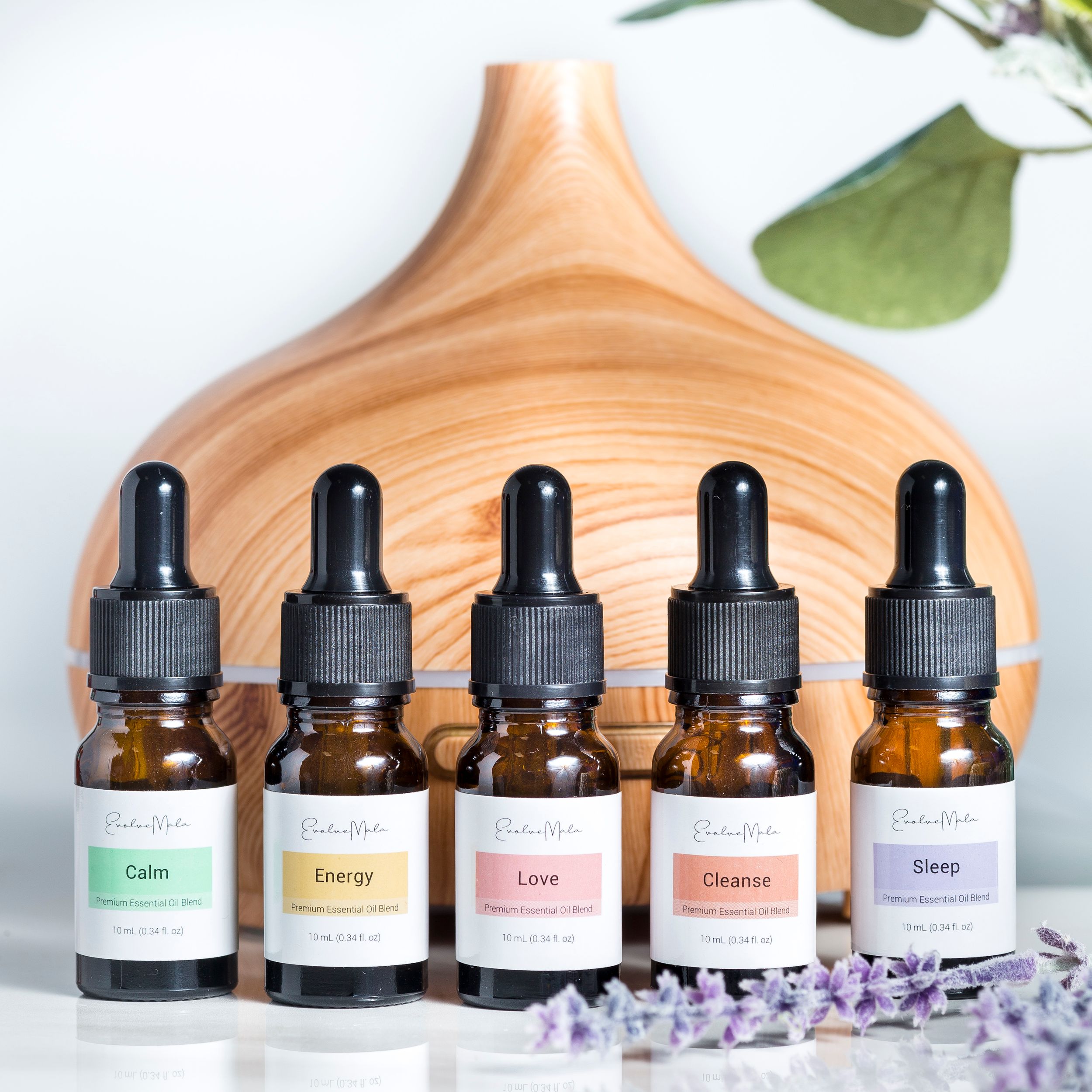Studio product photography in San Francisco Bay Area showcasing essential oil bottles with natural lighting and clean background