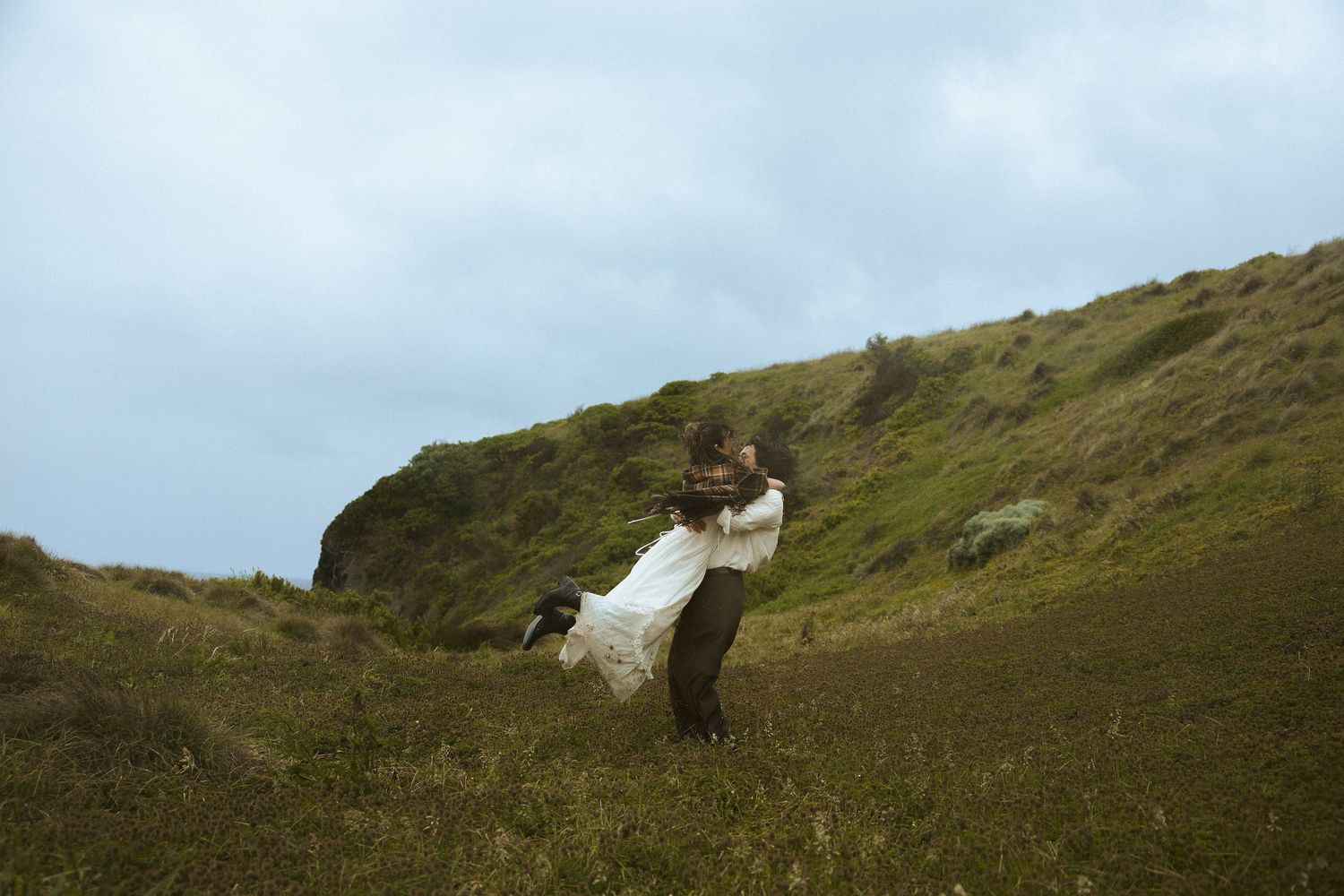 Moody engagement photos on a cold coastal day in Mornington Peninsula