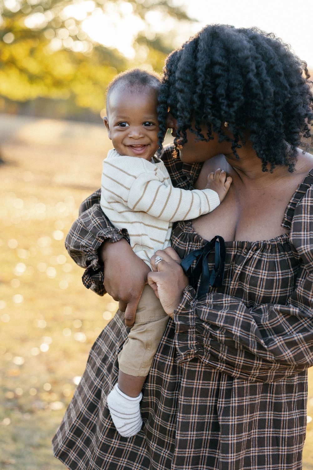 A heartwarming family moment captured in a series of candid shots during golden hour outdoors.