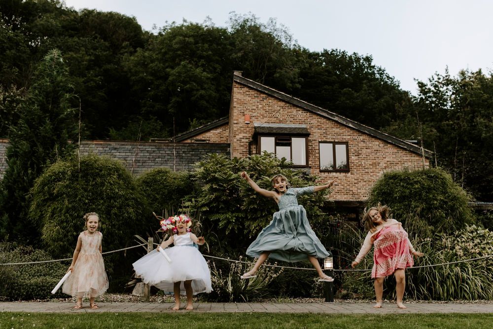 A series of outdoor wedding celebration photos showing guests and decor at a rustic venue in natural lighting.
