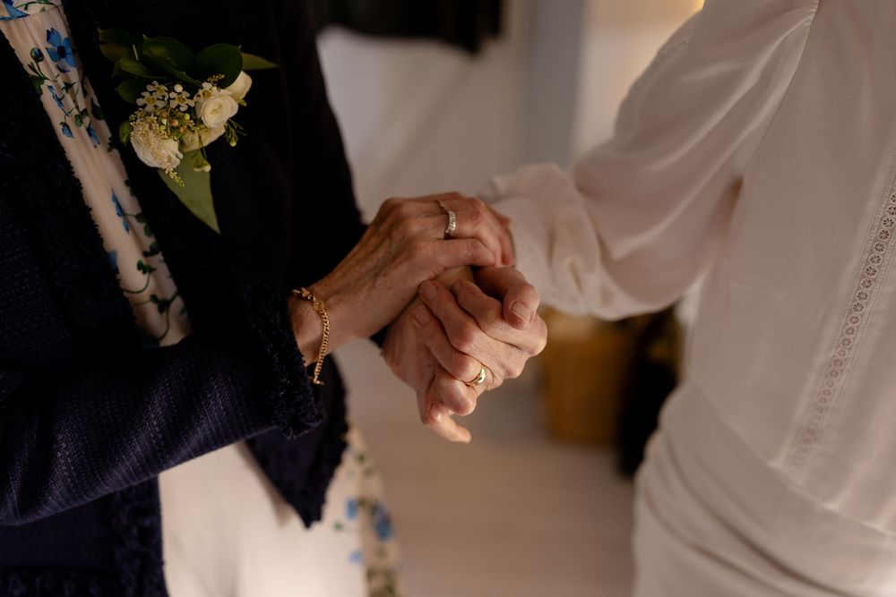 Wedding couple shares intimate moments during their first dance in an elegant reception venue.