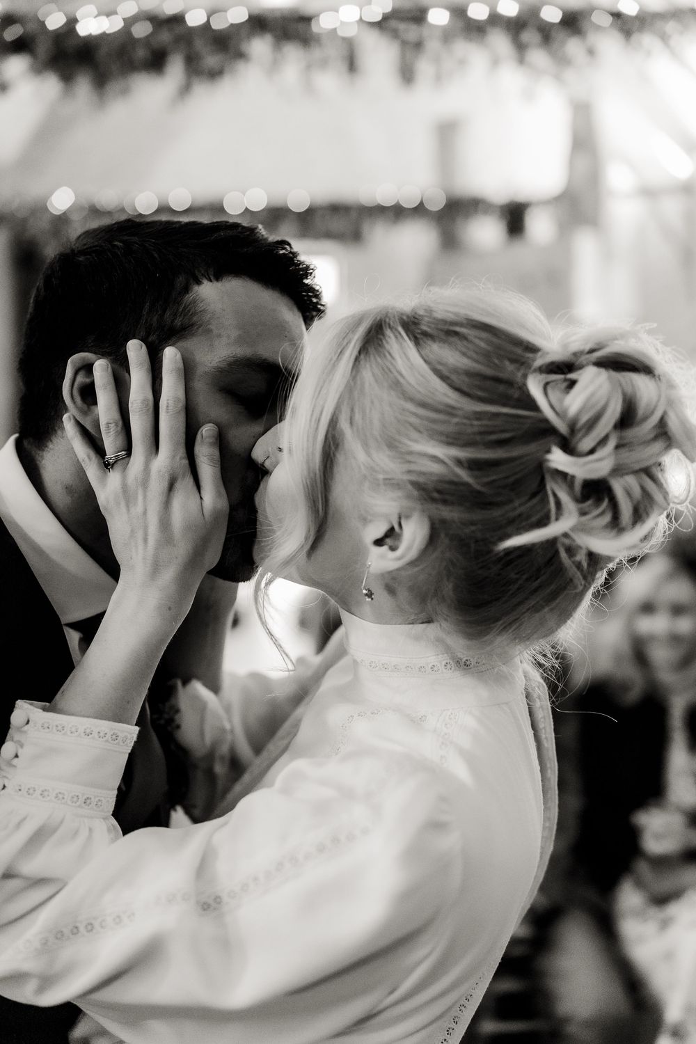 Black and white sequence of romantic moments between a couple in formal attire.