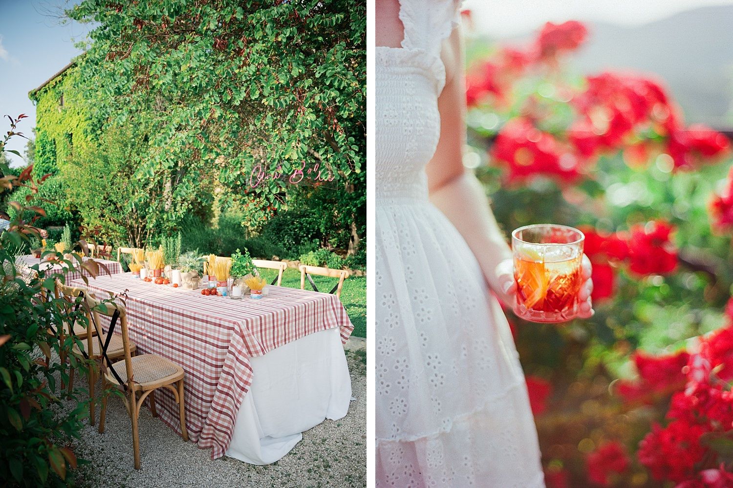 Elegant outdoor garden table setting with red checkered tablecloth beside vibrant red flowers and a summer cocktail.