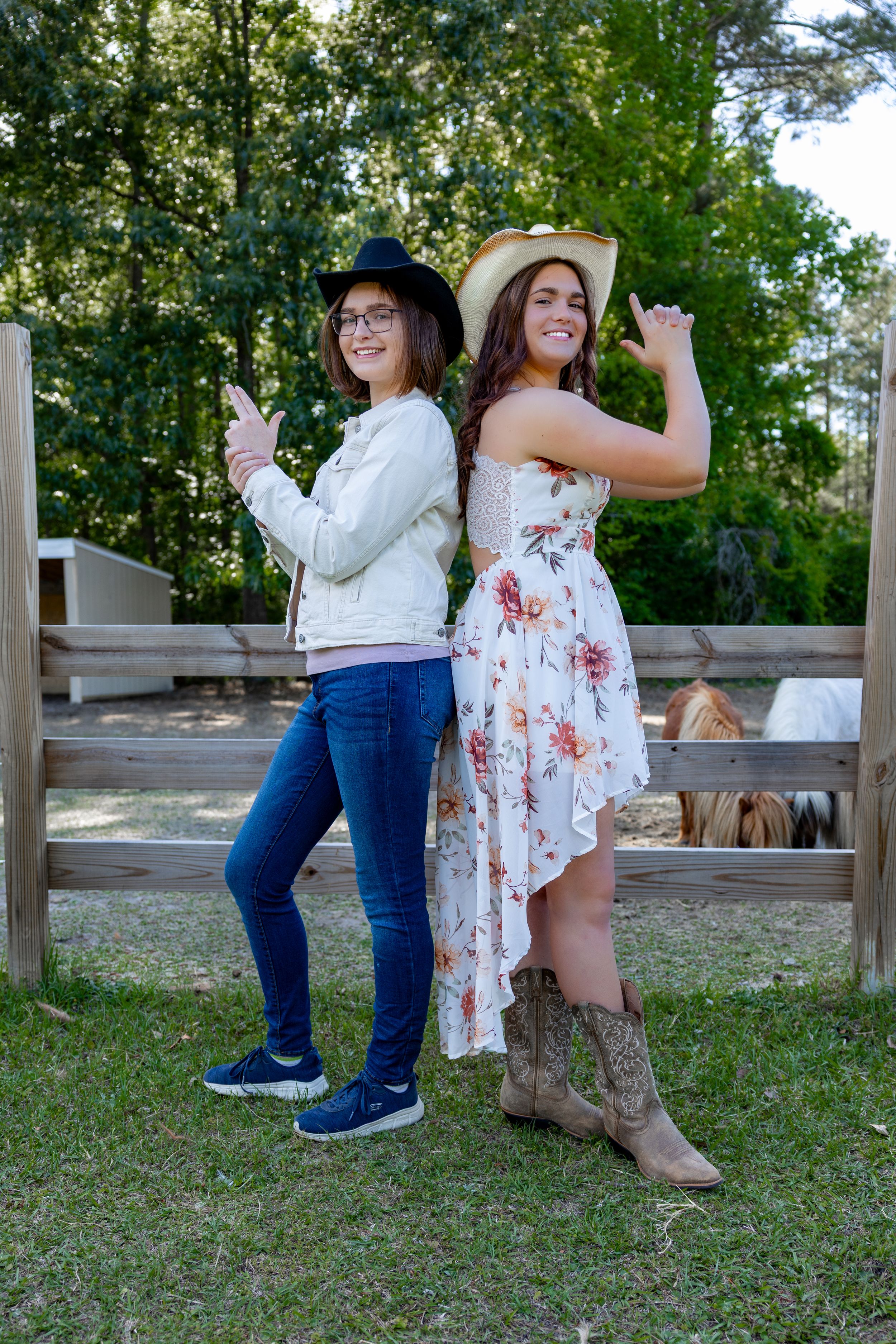 Four sequential photos showing feet and legs dancing and moving in a playful way outdoors on grass.