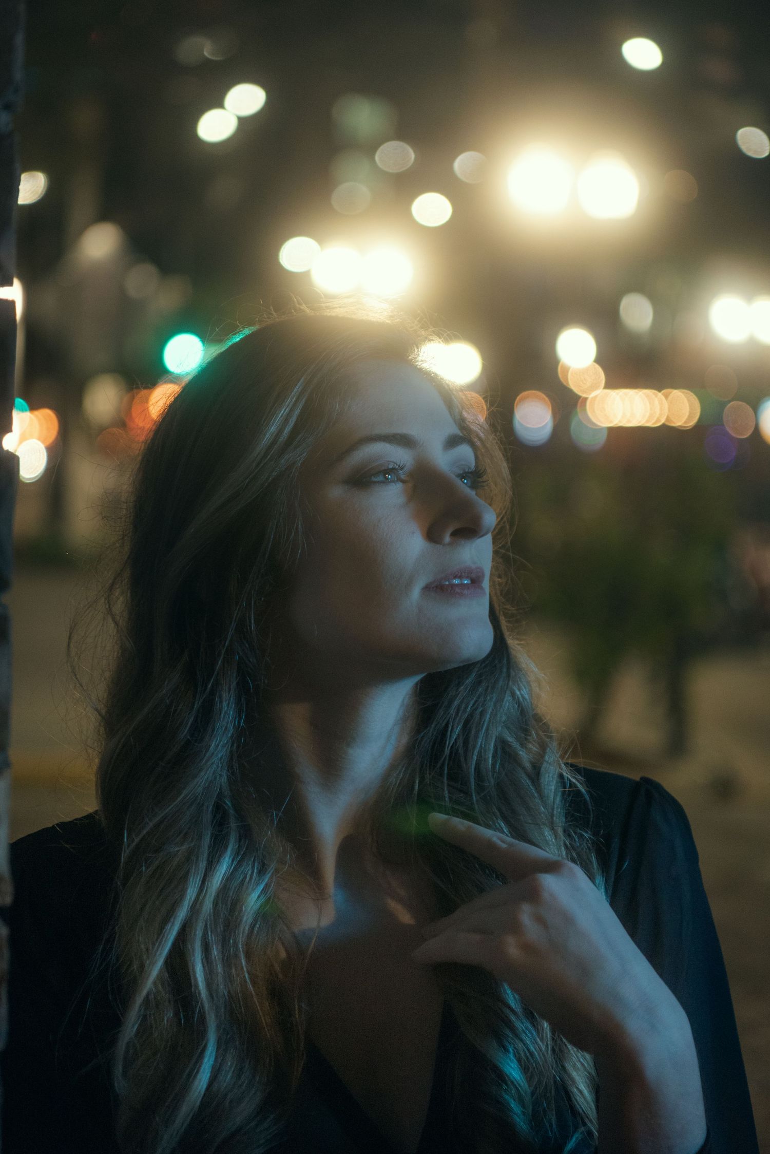 Cinematic night portrait session in Richmond VA inspired by downtown Orlando. Capture motion, light, and urban storytelling with a creative