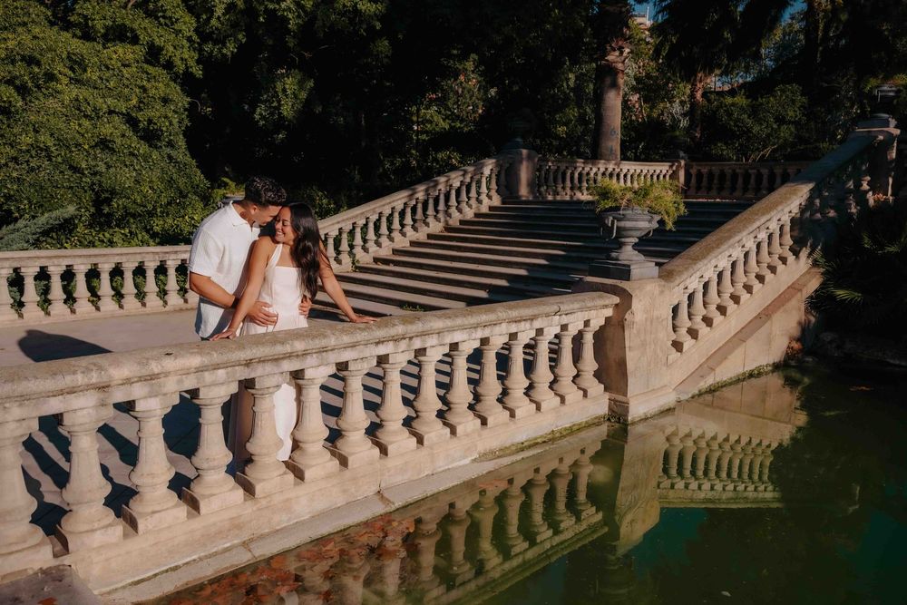 Authentic connection between couple visiting Barcelona for engagement.