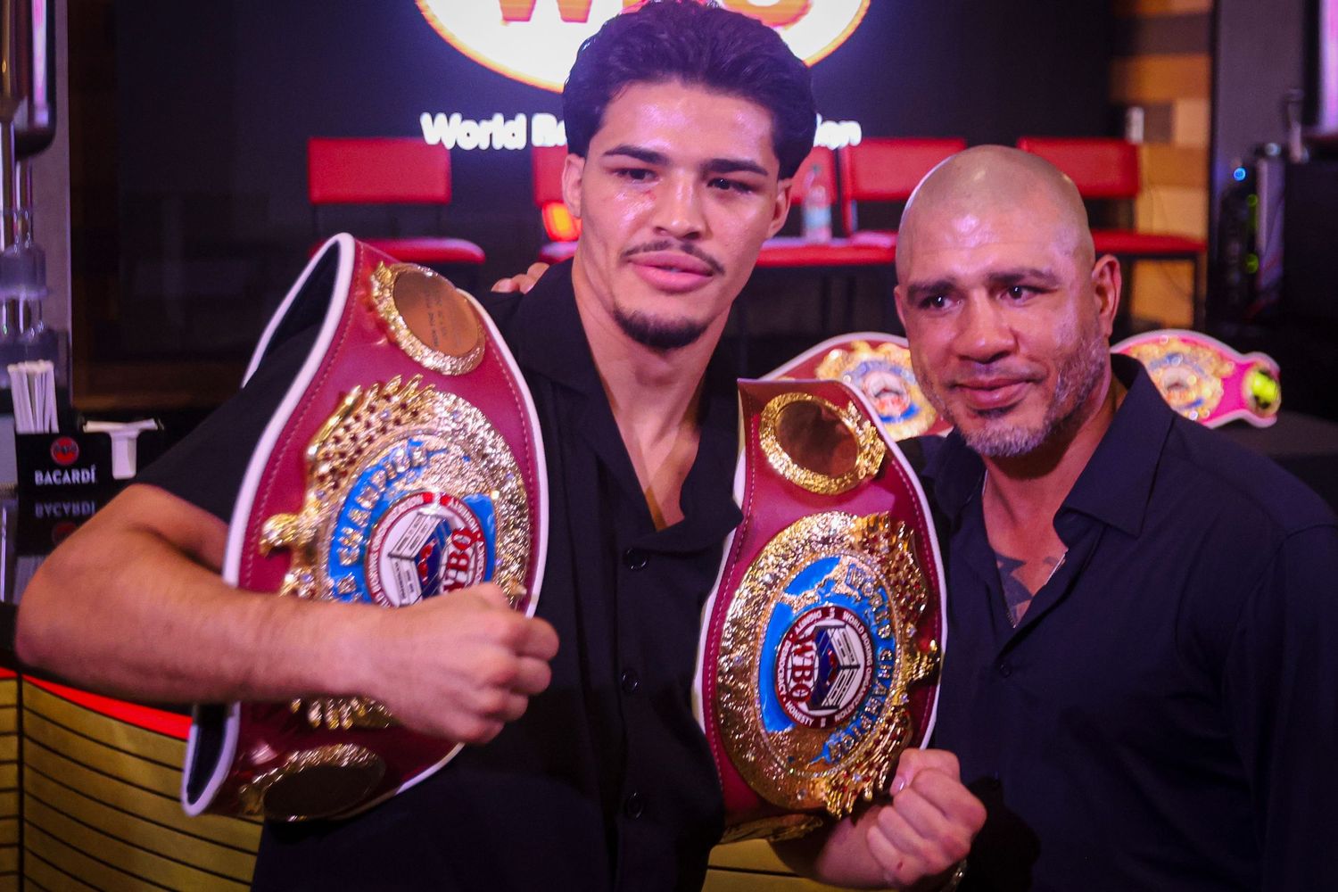 Xander Zayas, prospect from Puerto Rico, celebrates after receiving the WBO 154-pound world title from his idol Miguel Cotto.