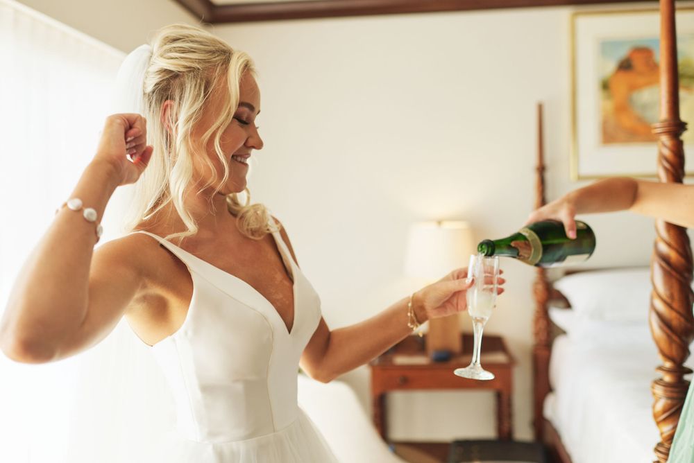 Candid moments of celebration and preparation before a wedding ceremony.