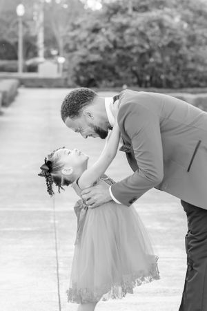 dad and daughter black and white photo