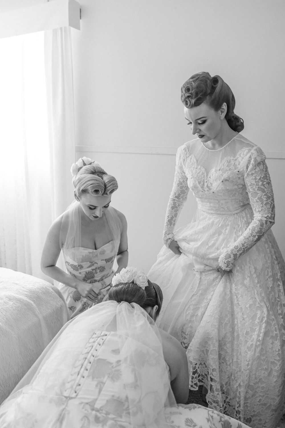 Bride putting on her vintage wedding gown the morning of her Vintage Inspired Country wedding in South Coast NSW on private family land