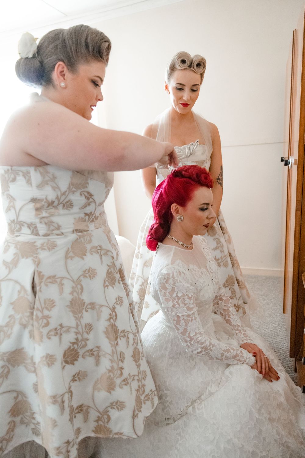Getting Ready Shot Ideas of the Bride in front of a vintage vanity wearing her Grandmother's Wedding Dress putting on her crown