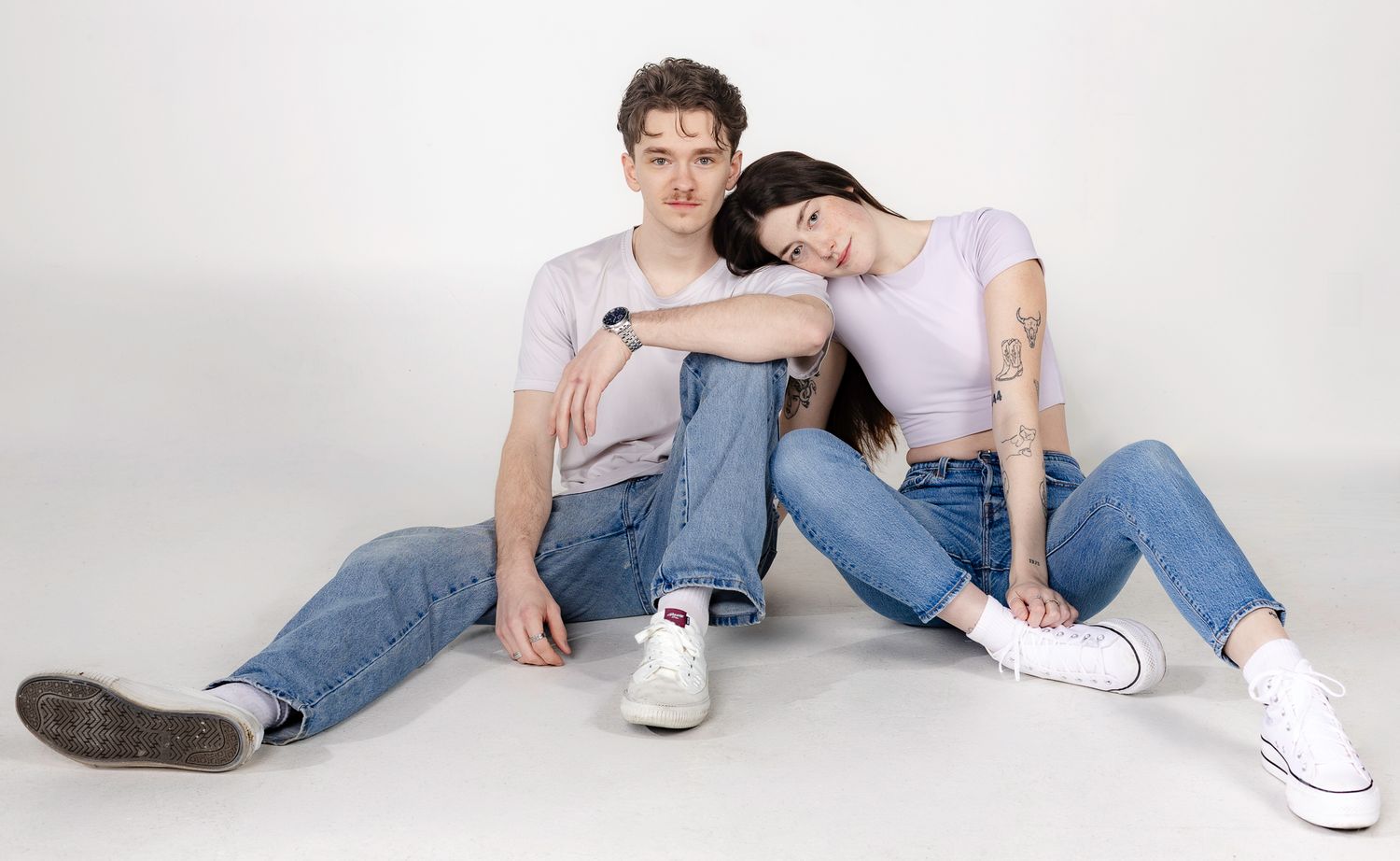 Casual posed sequence showing relaxed positions on white studio floor.
