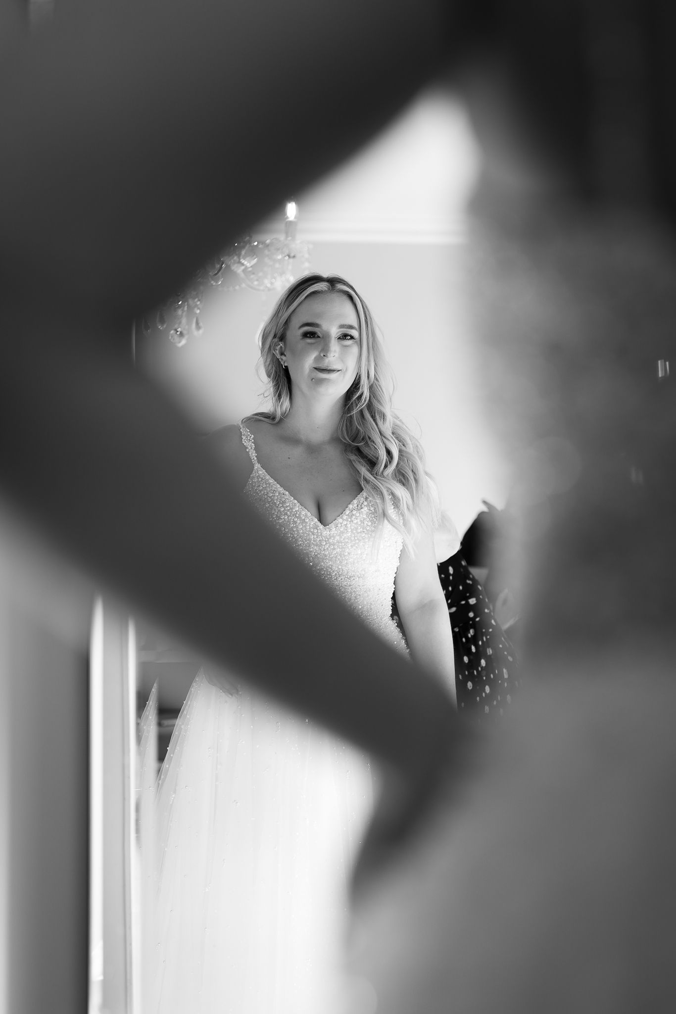 Artistic black and white portraits with dramatic lighting and shadows.