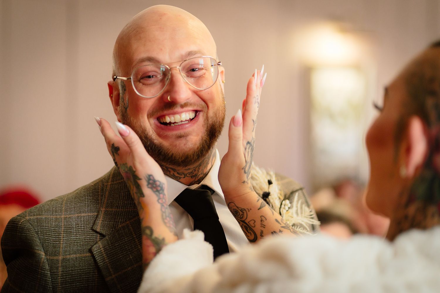 Candid reception photos showing guests sharing joyful moments and laughter.