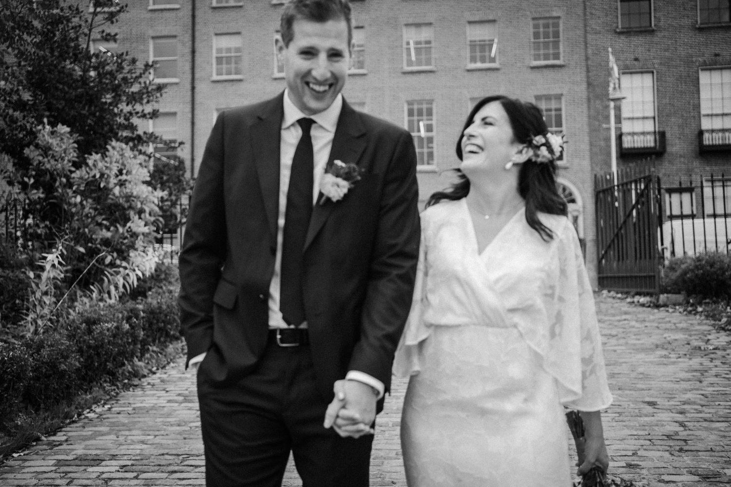 A series of vintage black and white wedding photographs showing couples walking and posing in formal attire.