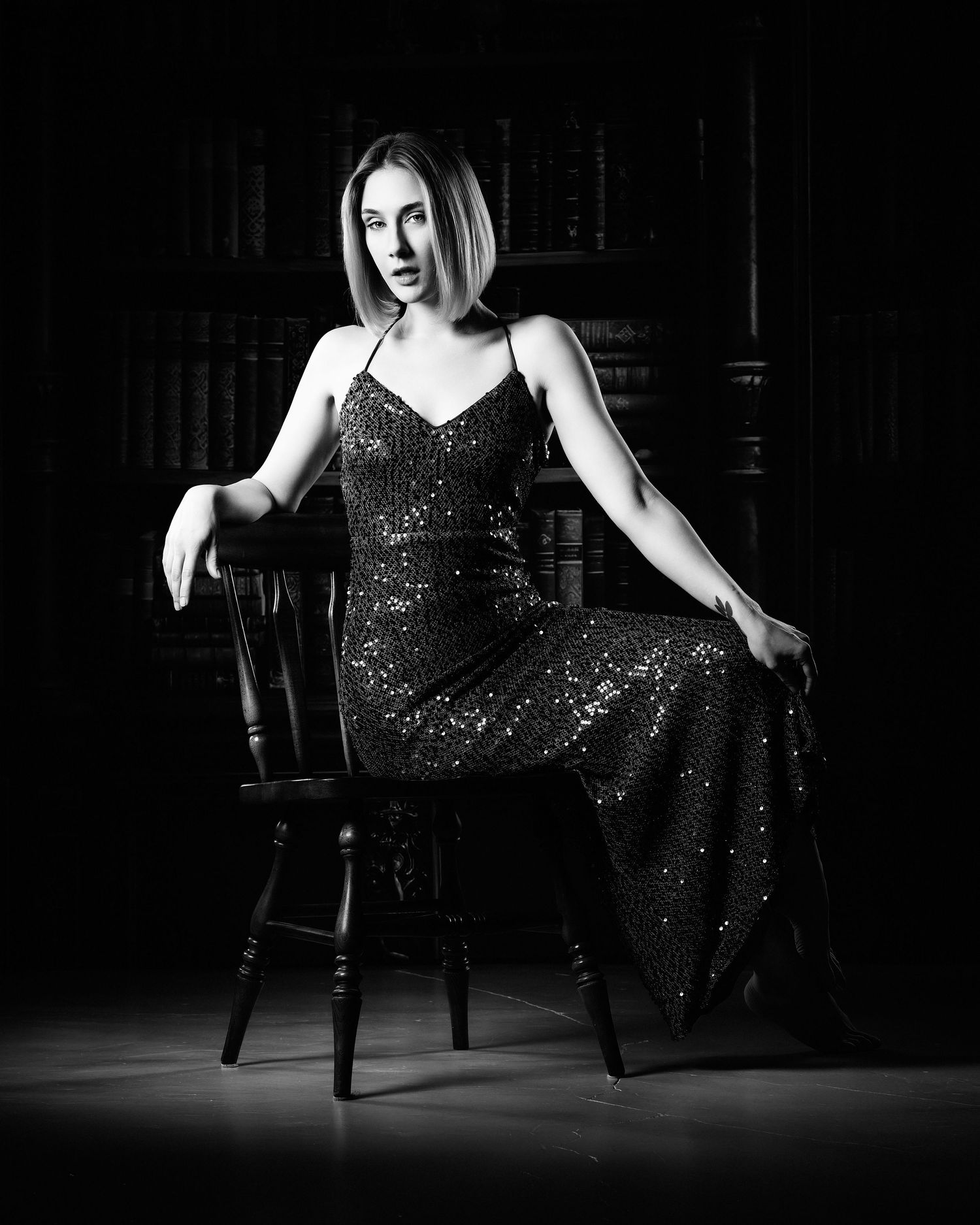 David G Holt Photography - Elegant poses in sparkly black dress against dark background with dramatic lighting.