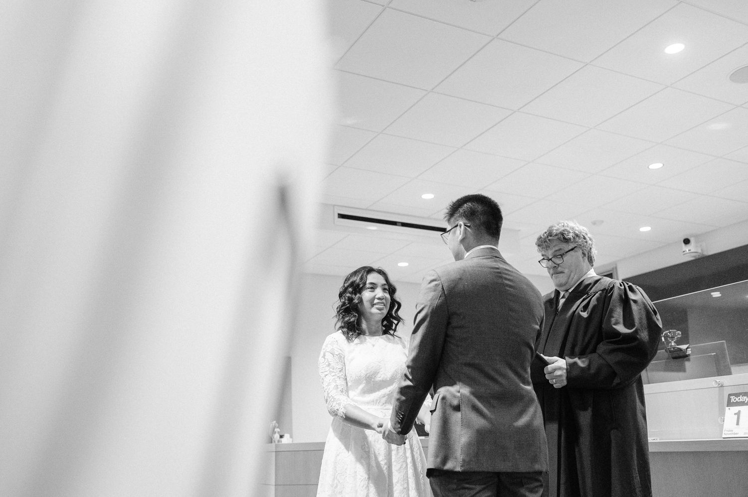 black and white photo of couple getting married at courthouse on Bainbridge Island