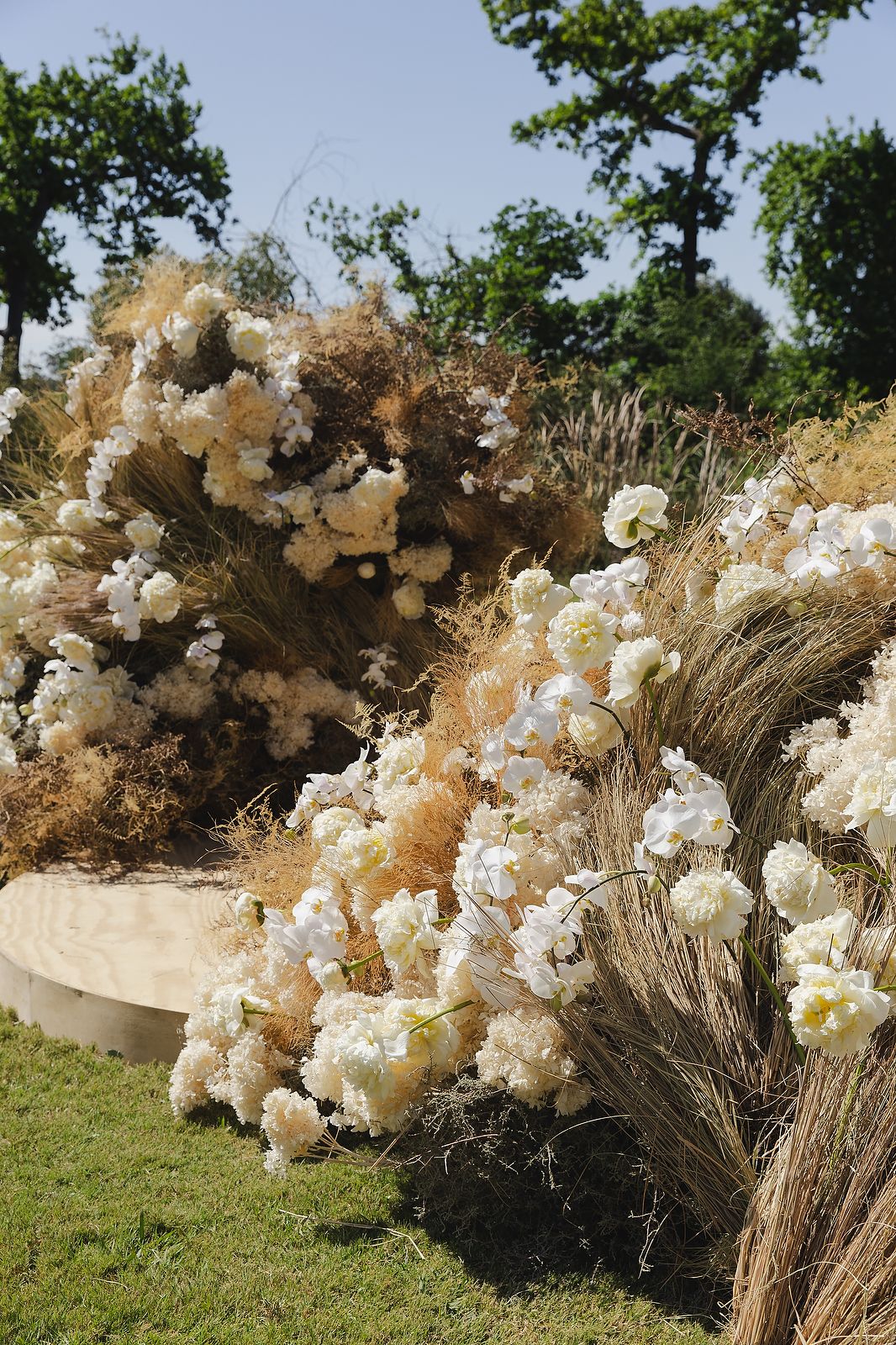 Textured floral installation by Fleur le Cordeur in soft, muted tones.