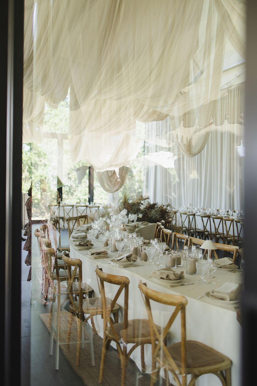 Minimalist wedding décor with layered textures and muted colour palette.