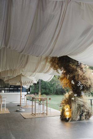 Textured floral installation by Fleur le Cordeur in soft, muted tones.