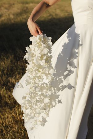 Close up of wedding orchid bouquet in soft lighting