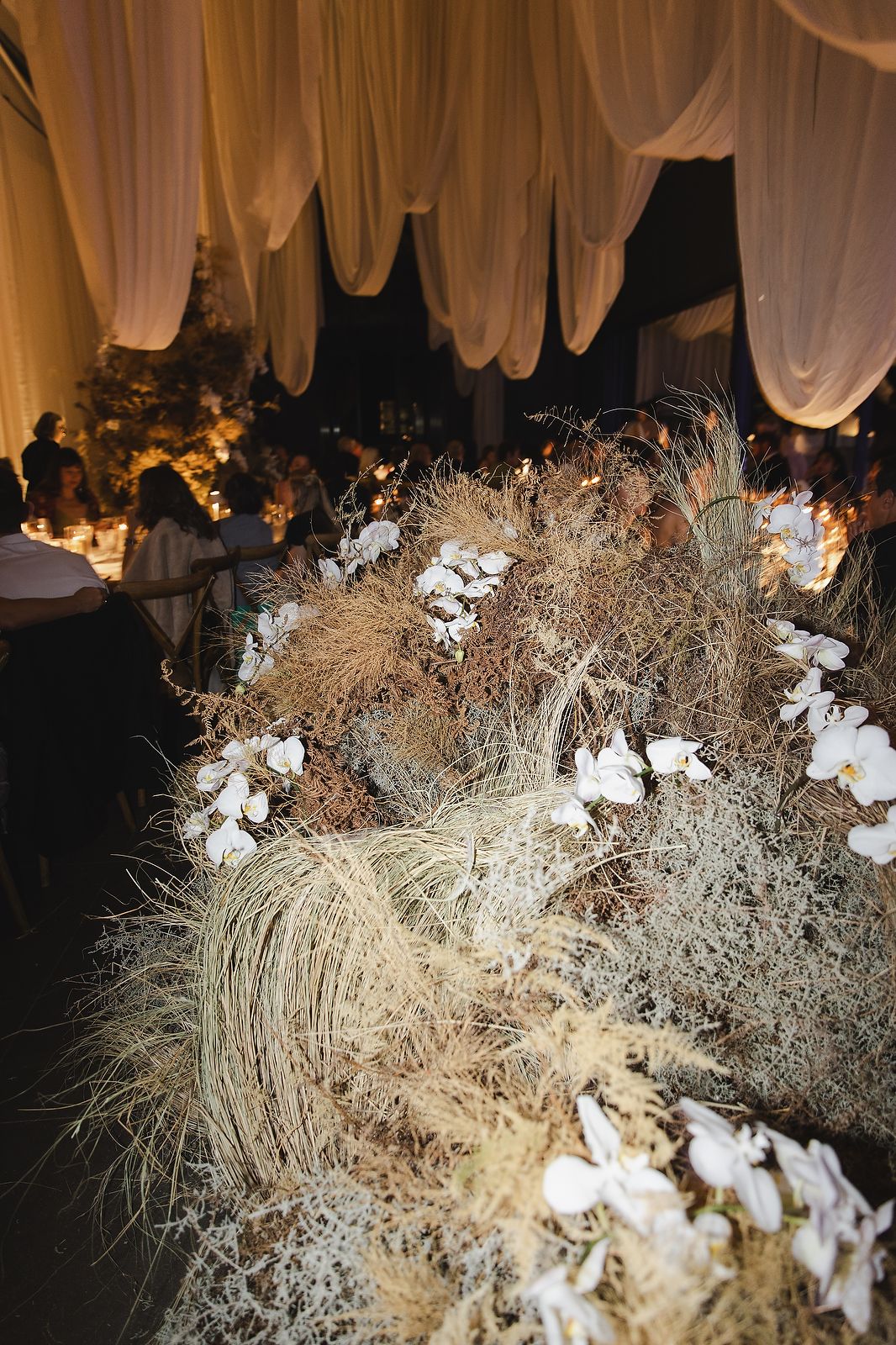 Styled wedding space combining modern florals and historic architecture.