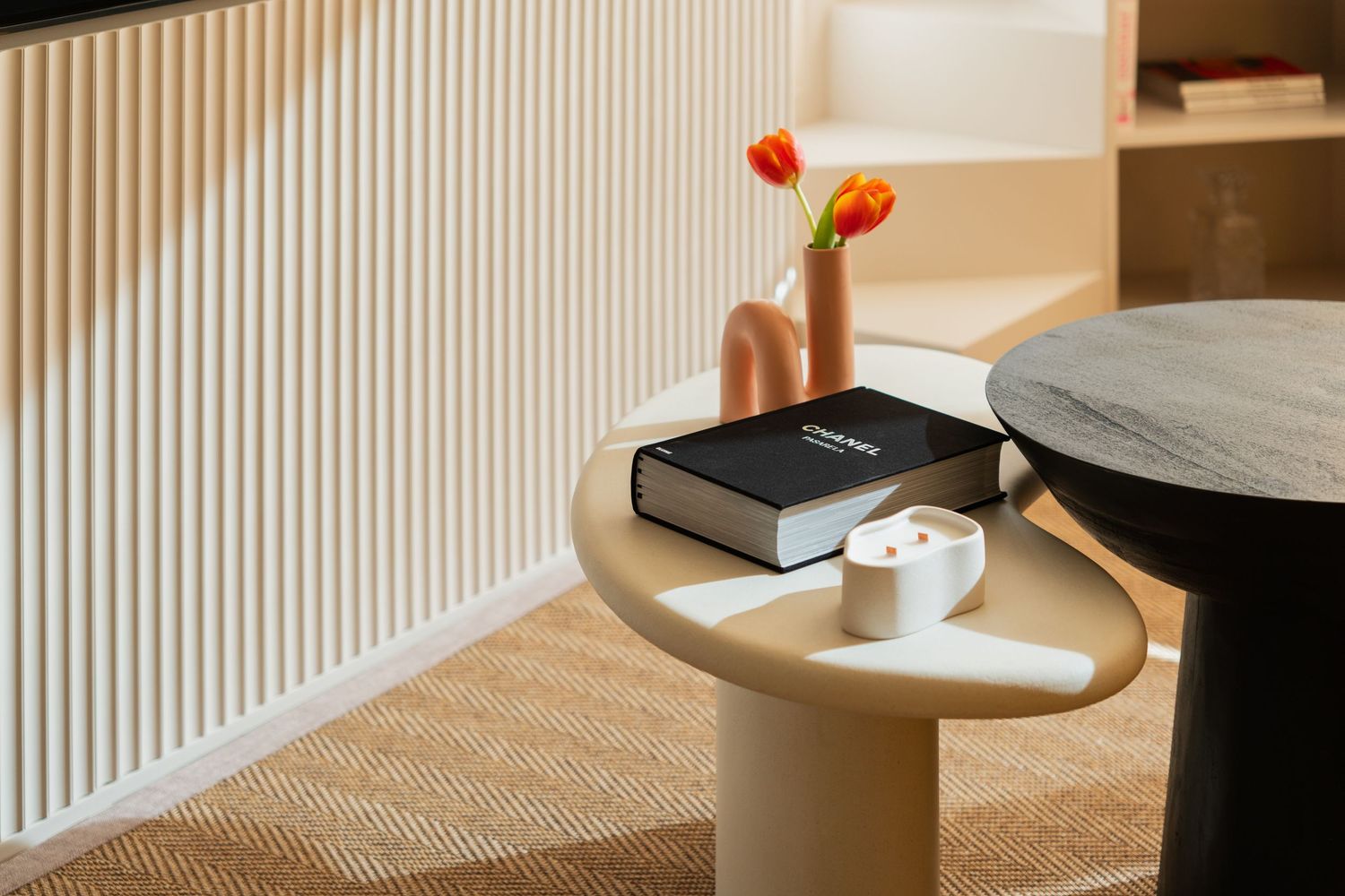 A series of minimalist interior design photos showing white walls with floating shelves and modern decor elements.