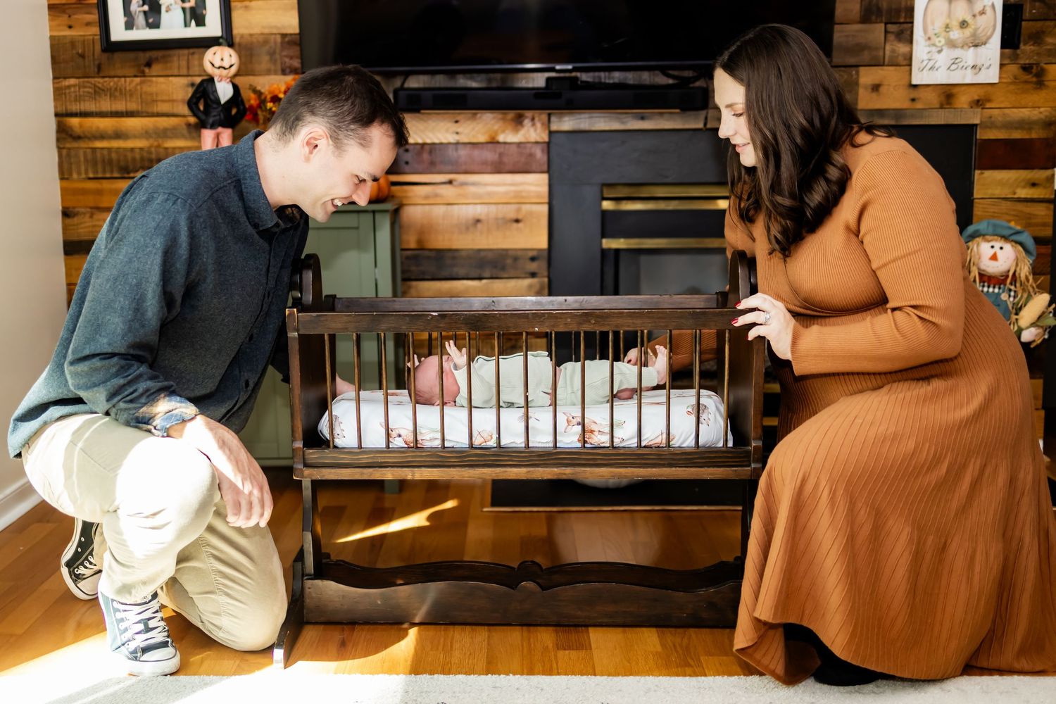 Your baby in your home with sentimental crib posing for a lifestyle newborn session in Richmond, Henrico VA. Newborn lifestyle photographer