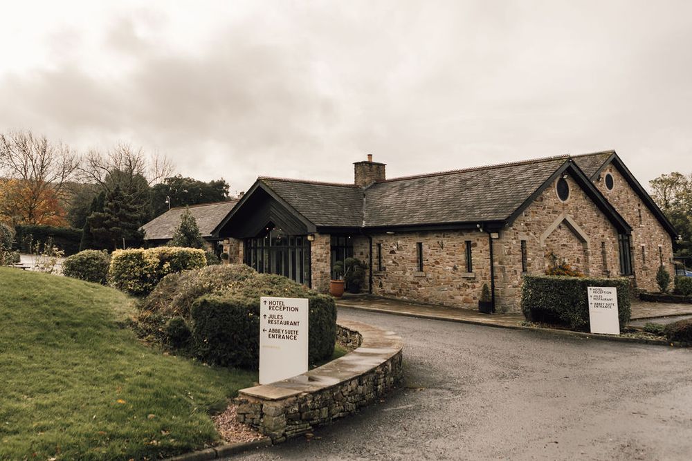 Stone buildings and pathways at Mytton Fold hotel and golf complex.