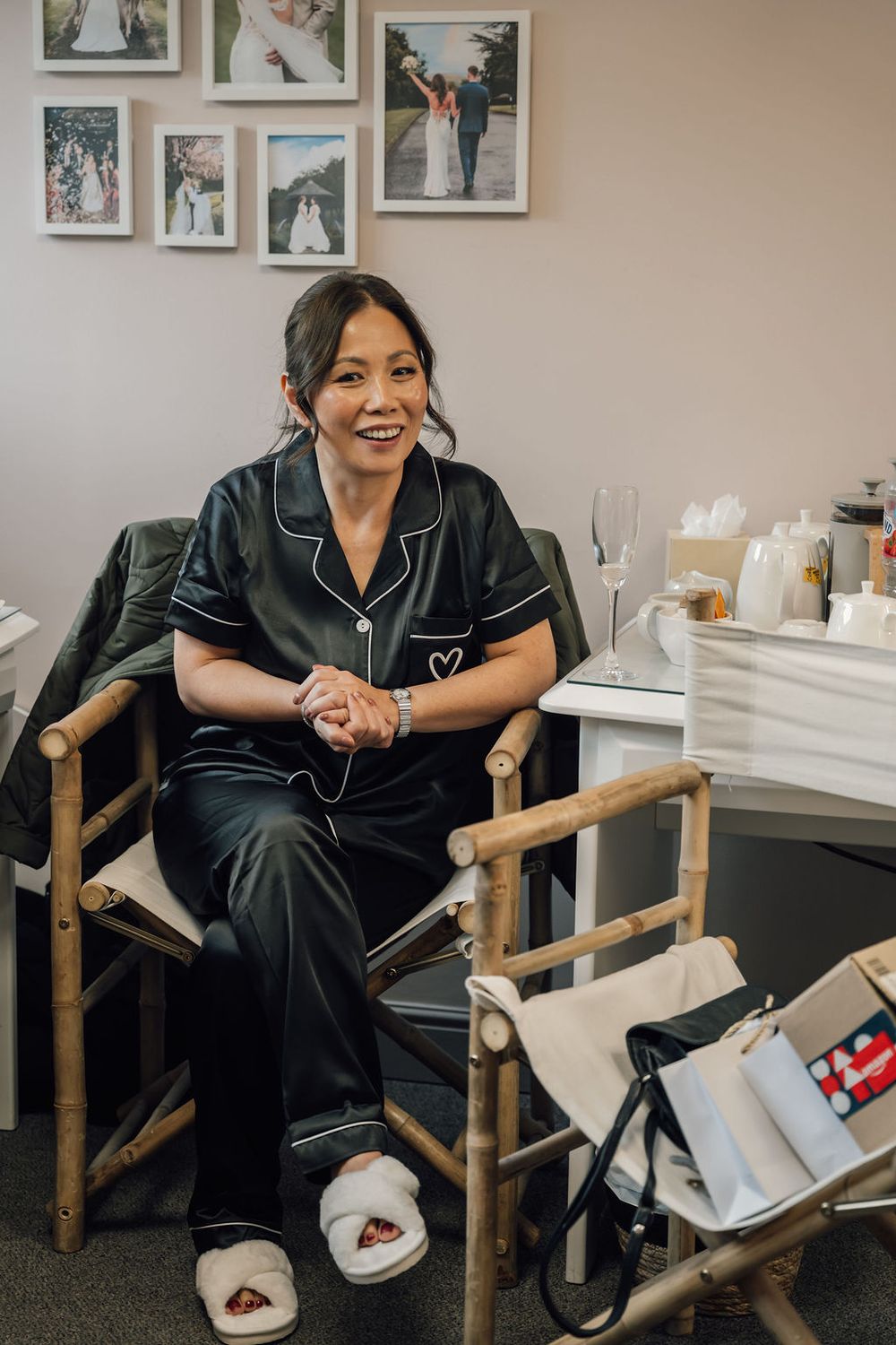 Relaxed moment in director's chair during wedding day preparations.