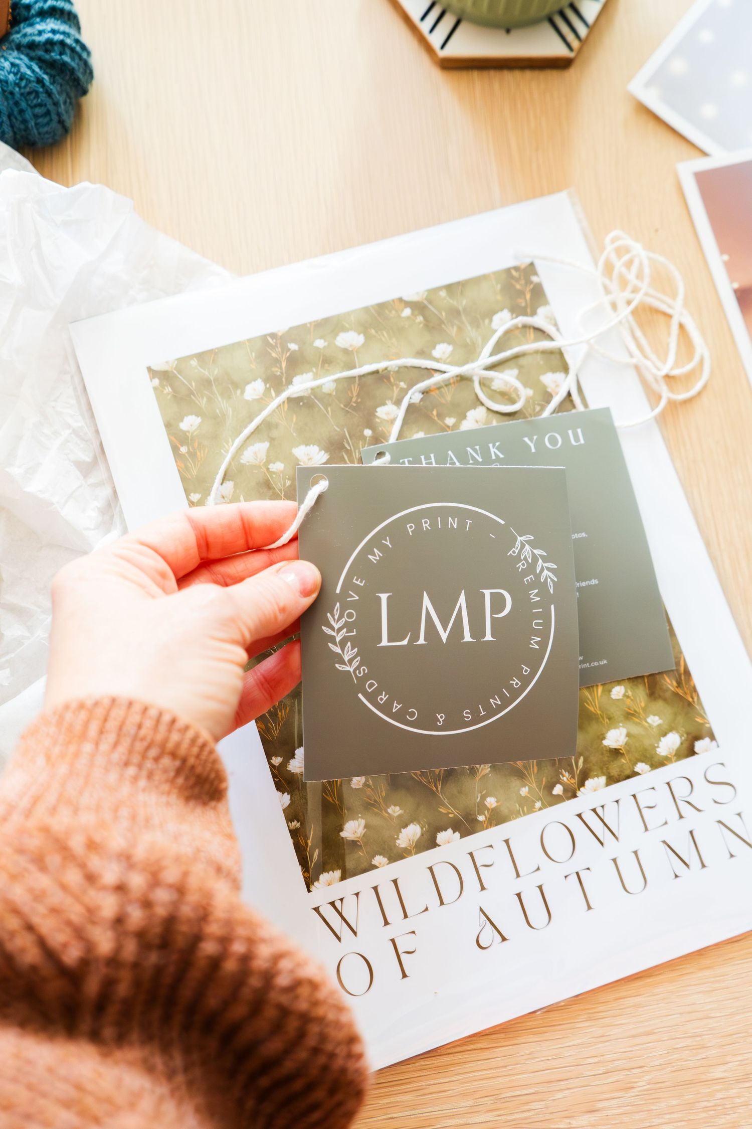 Compelling product photography showing photo prints and art provided by a small business, photo by Jo Fisher at BLOOM Fabulous Photography