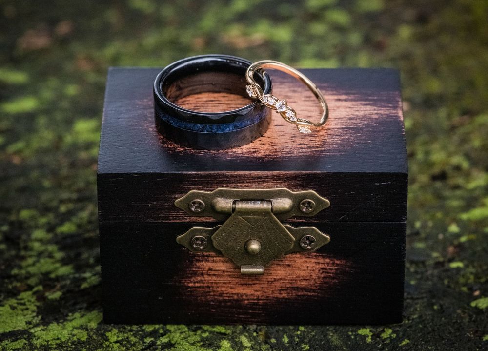 A collection of close-up shots showing details of vintage wooden boxes with metal clasps and hinges.