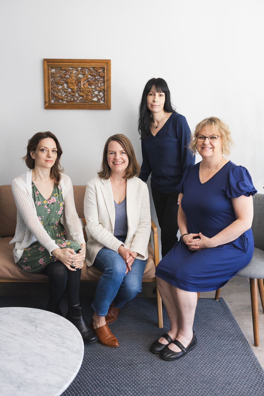 Maple Valley, WA acupuncture 3 female woman acupuncturists practitioners and front desk assistant sitting in client lobby for great photo
