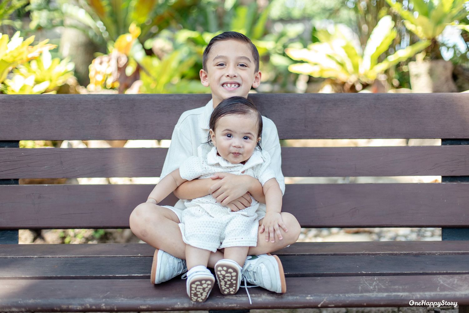 Family portrait session at Cove Gardens and Resort featuring parents and children sharing natural smiles and candid moments.