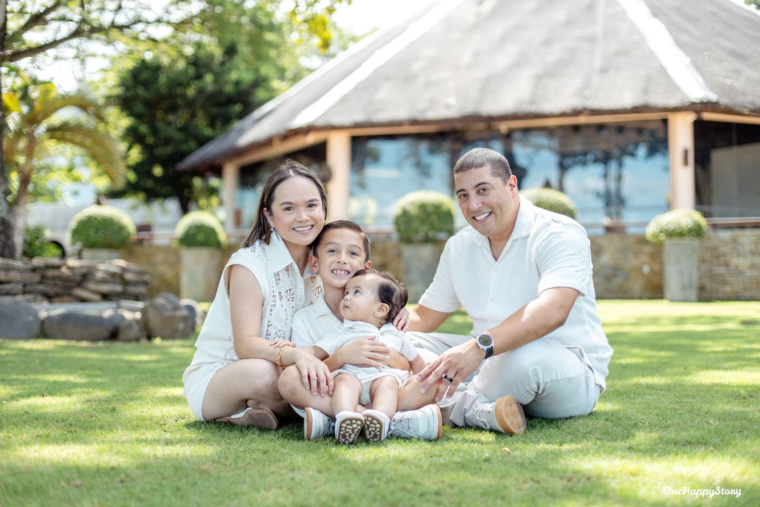 Family portrait session at Cove Gardens and Resort featuring parents and children sharing natural smiles and candid moments.